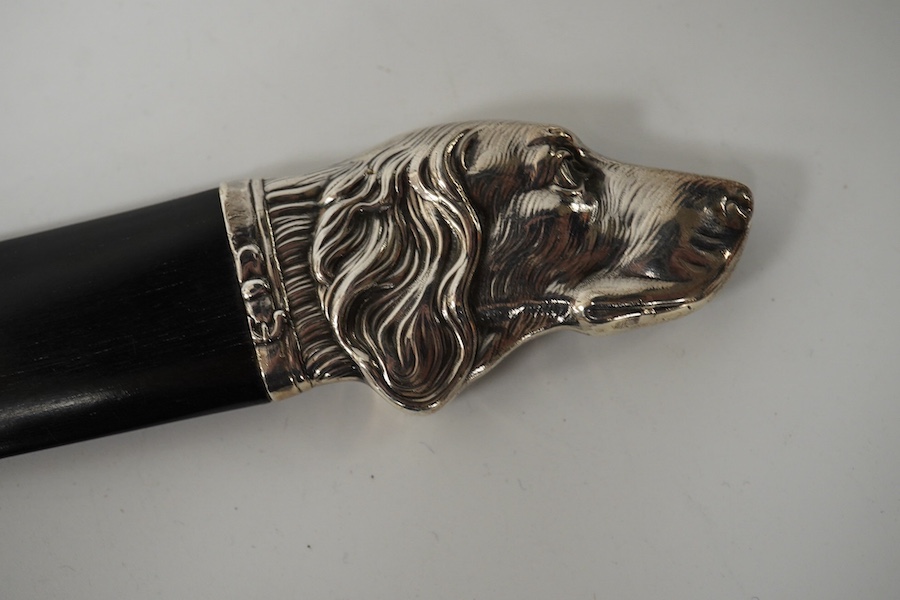 A modern silver mounted wooden paper knife with dog's head finial, London, 2004, 25.6cm. Condition - good